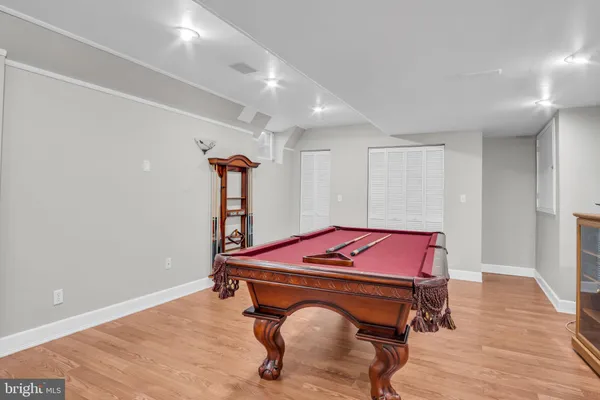 a room with furniture and wooden floor