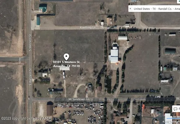a view of a kitchen with a sink and cabinets