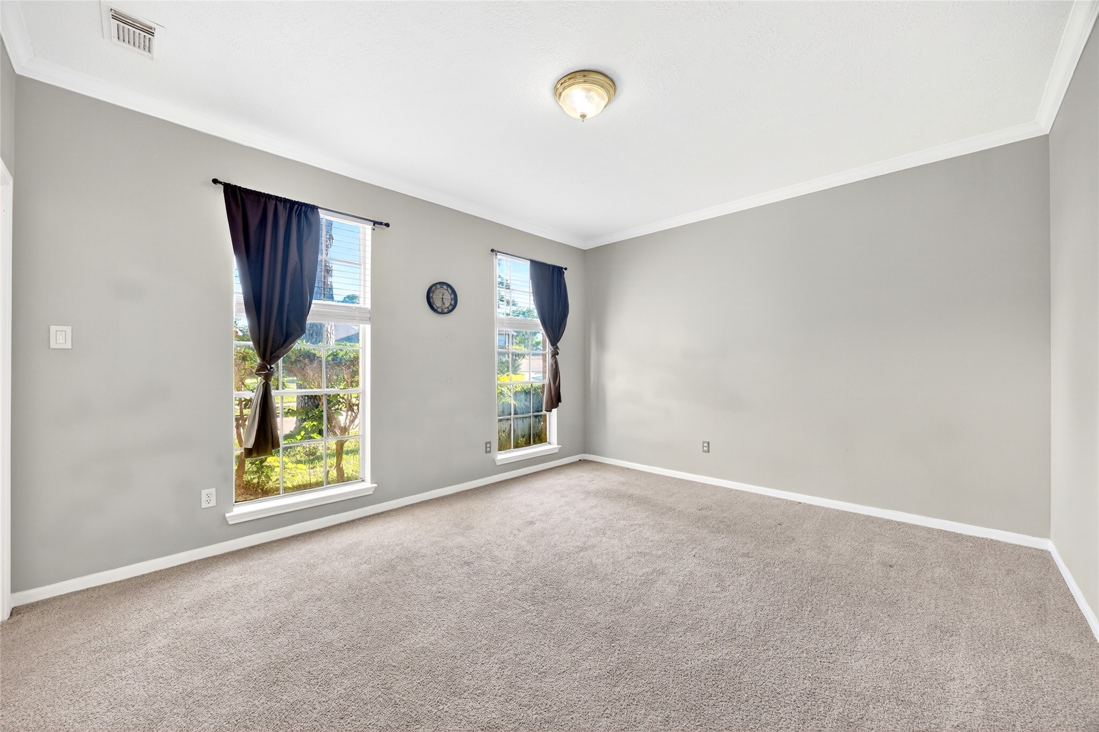 10615 Vandercroft Court Houston, TX 77070 - Photo 11 of 47 a view of an empty room with window and closet area