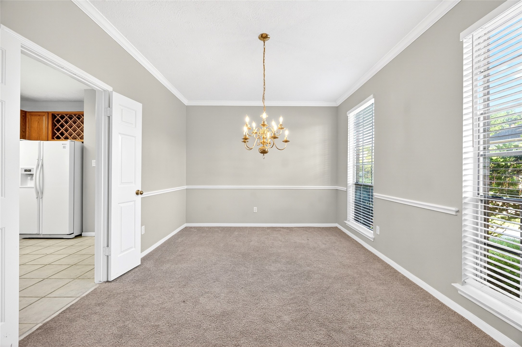 10615 Vandercroft Court Houston, TX 77070 - Photo 13 of 47 a view of an empty room with a window