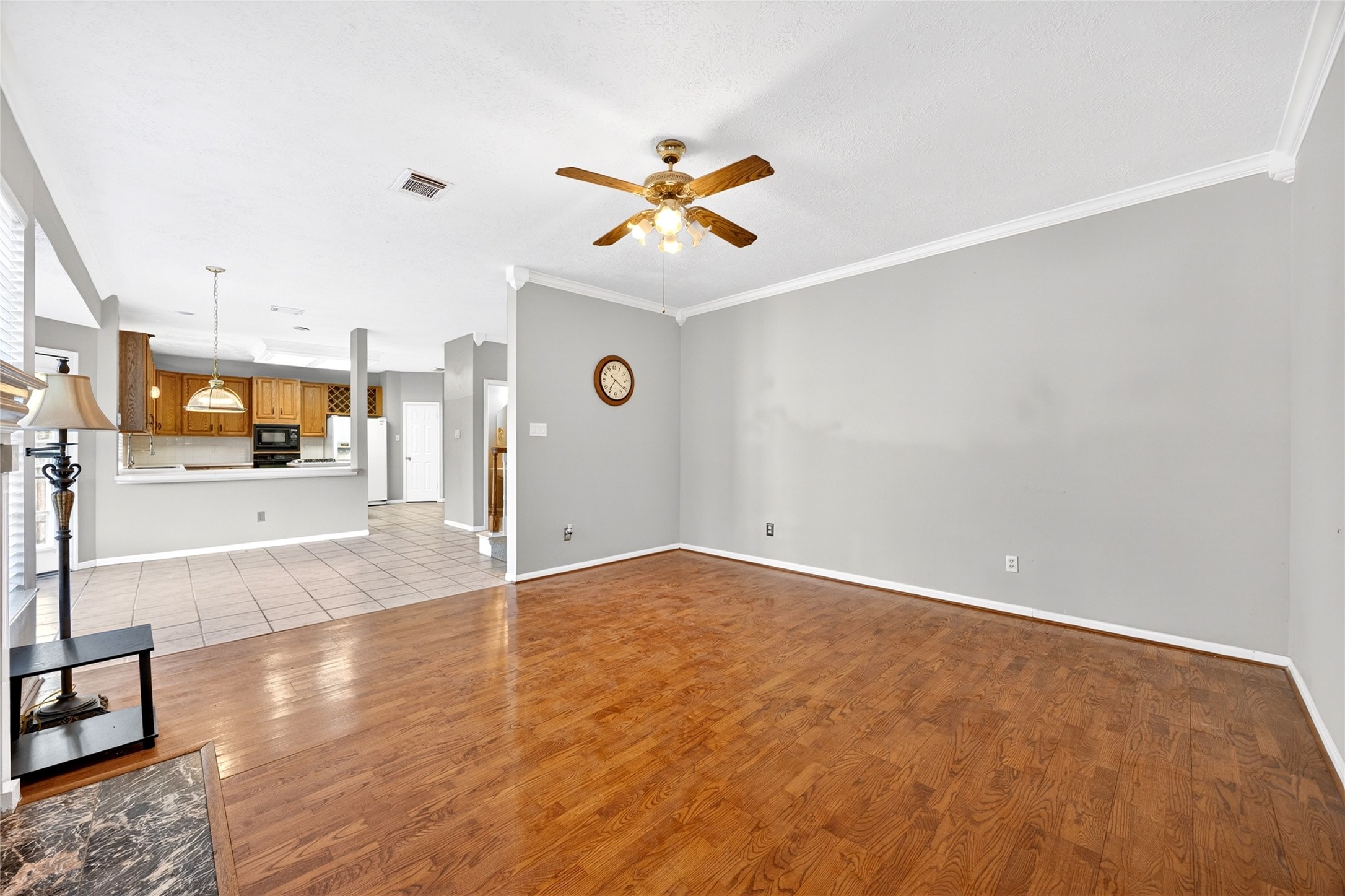10615 Vandercroft Court Houston, TX 77070 - Photo 14 of 47 a view of a livingroom with wooden floor