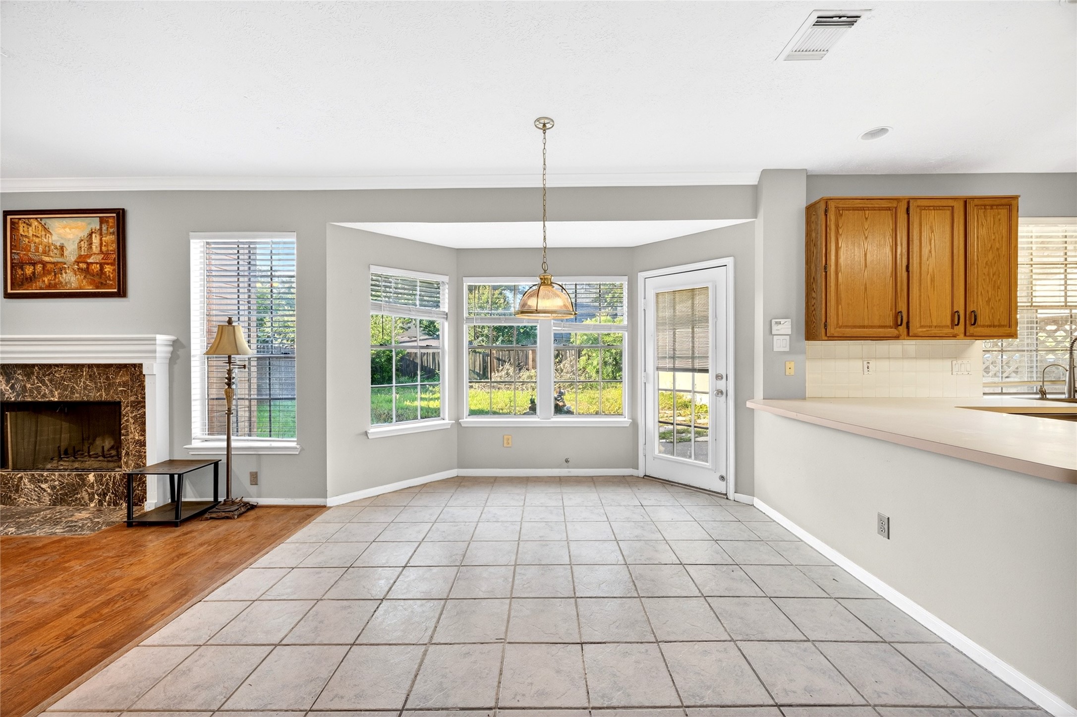 10615 Vandercroft Court Houston, TX 77070 - Photo 22 of 47 a view of an empty room with window and chandelier