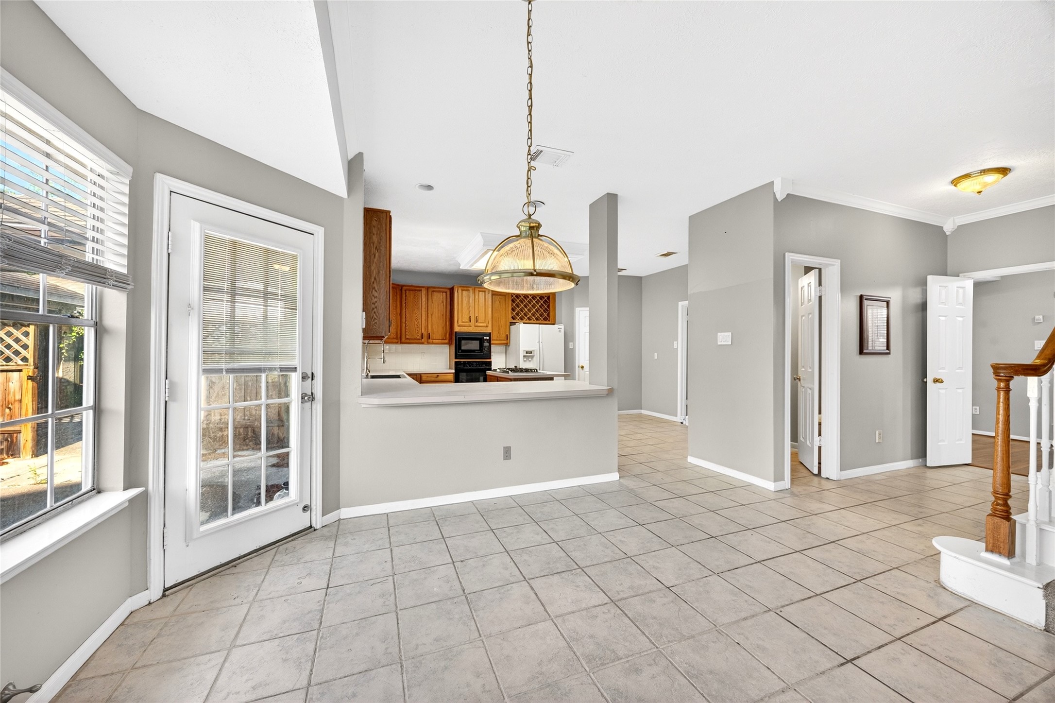 10615 Vandercroft Court Houston, TX 77070 - Photo 23 of 47 a view entryway an empty room and window