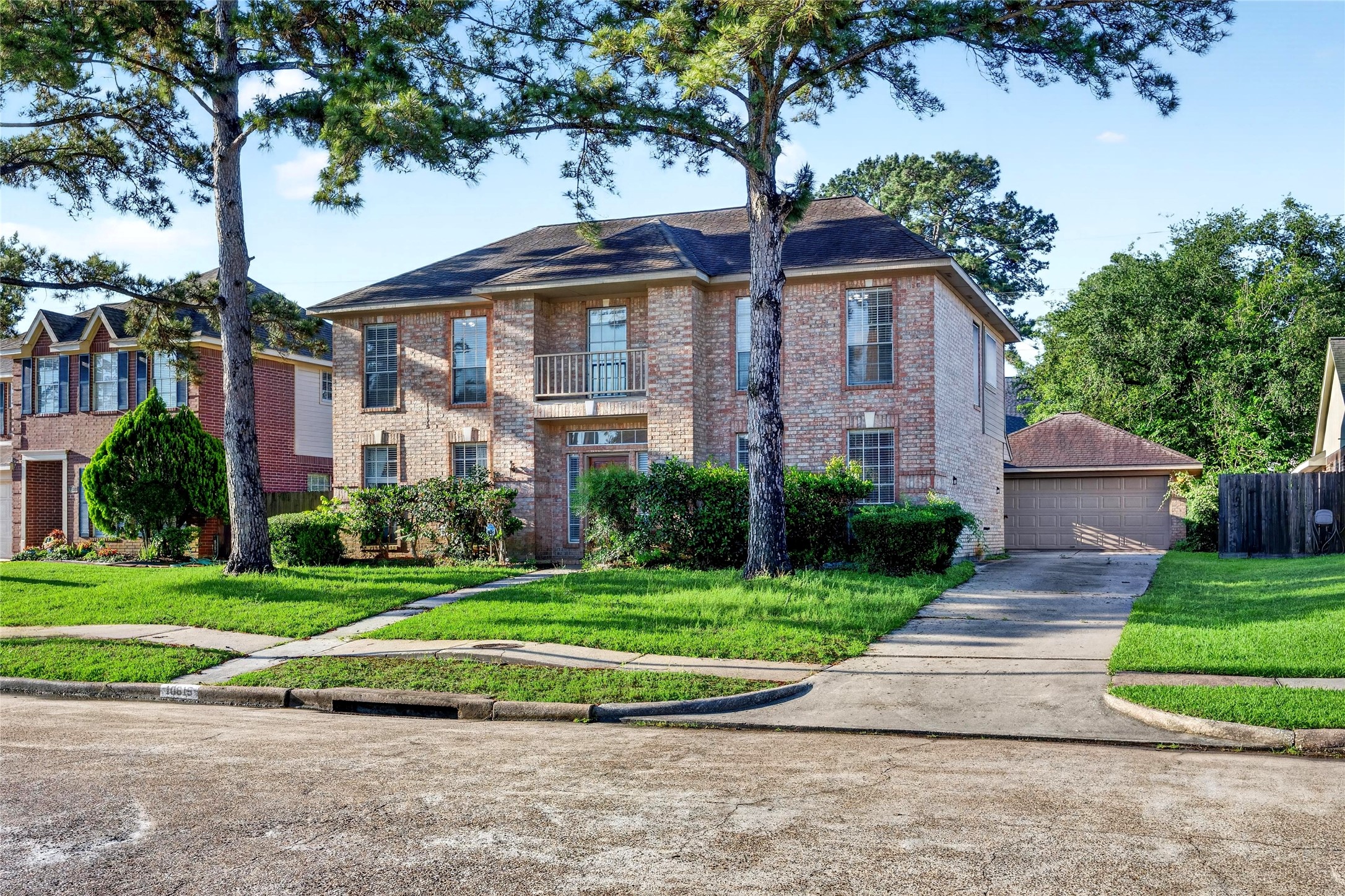 10615 Vandercroft Court Houston, TX 77070 - Photo 3 of 47 a front view of a house with a yard
