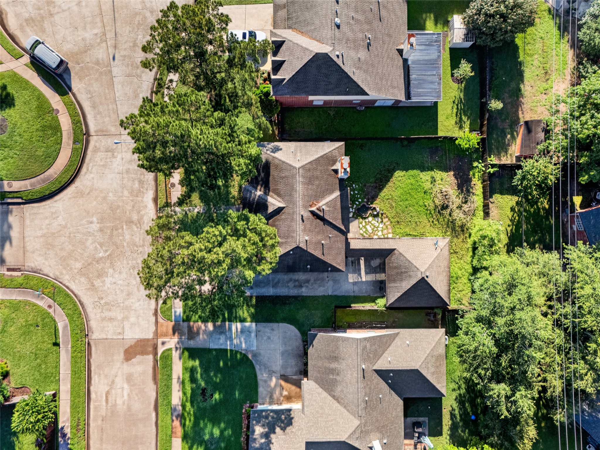 10615 Vandercroft Court Houston, TX 77070 - Photo 45 of 47 an aerial view of a house with swimming pool and garden