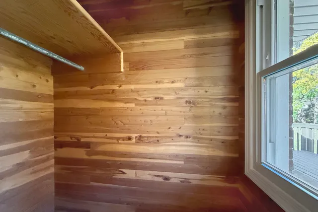 a view of walk in closet with window