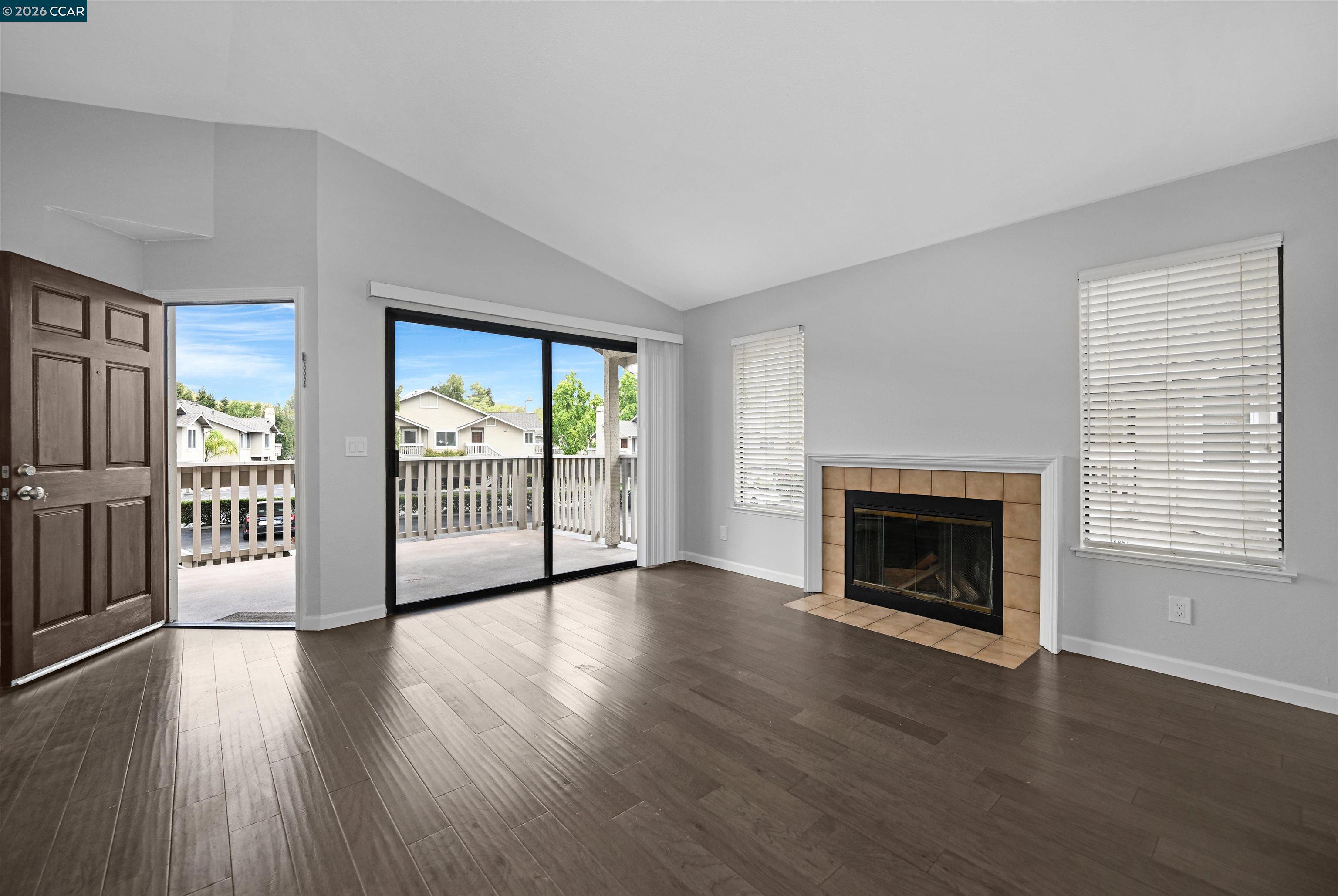 3659 Crow Canyon Road San Ramon, CA 94582 - Photo 9 of 26 a view of an empty room with wooden floor and a window