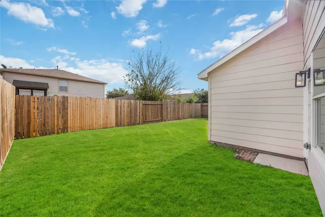 a view of a backyard with a garden
