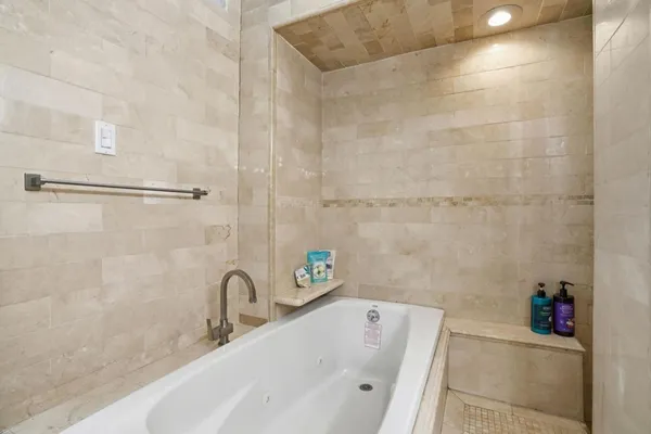 a bathroom with a bathtub