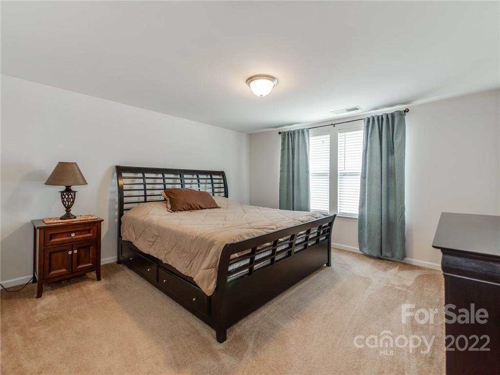 79378 Ridgehaven Road Lancaster, SC 29720 - Photo 27 of 36 a bedroom with a bed and a window