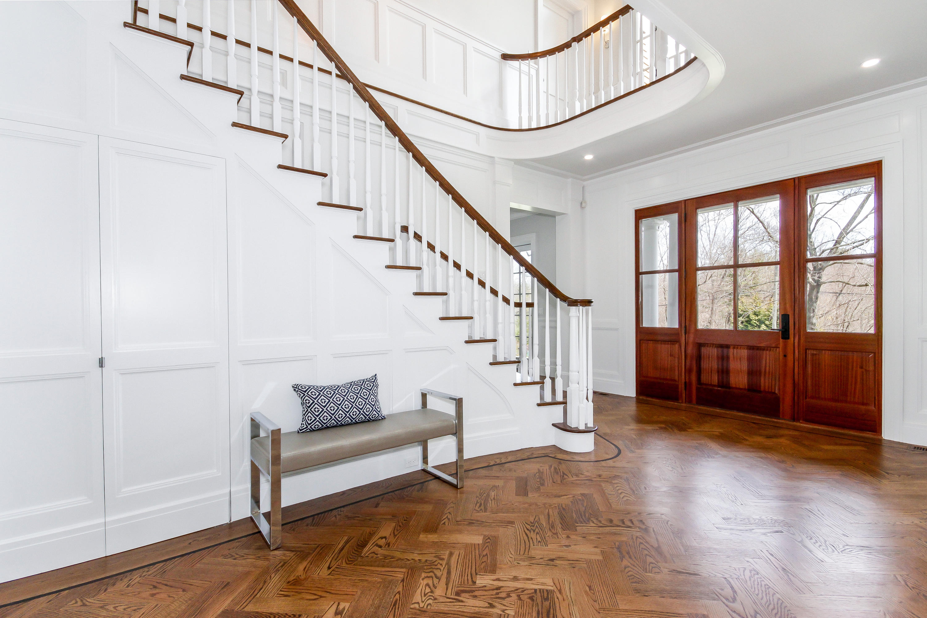 134 Lambert Road New Canaan, CT 06840 - Photo 3 of 50 a view of entryway and hall with wooden floor