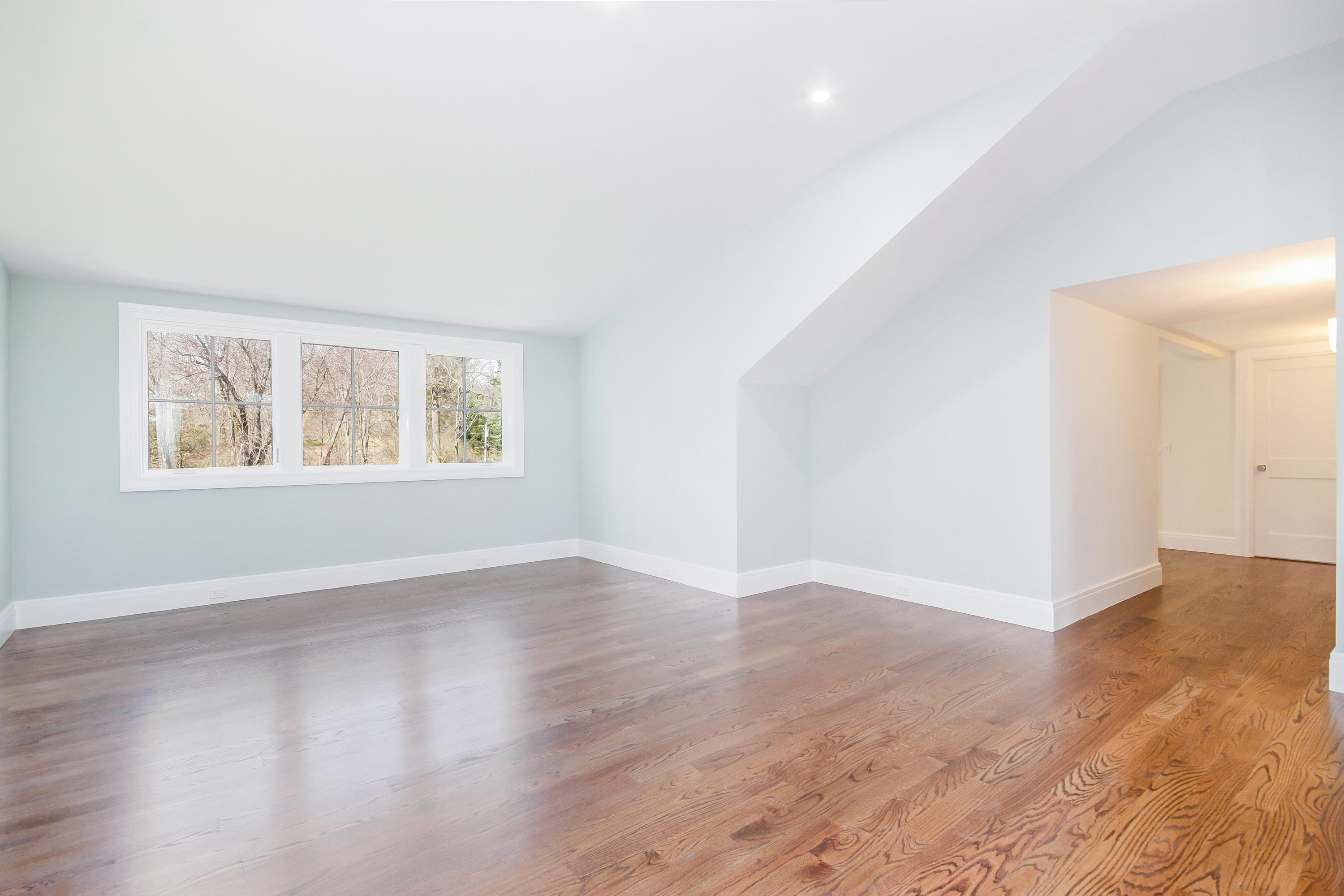 134 Lambert Road New Canaan, CT 06840 - Photo 38 of 50 an empty room with wooden floor and windows