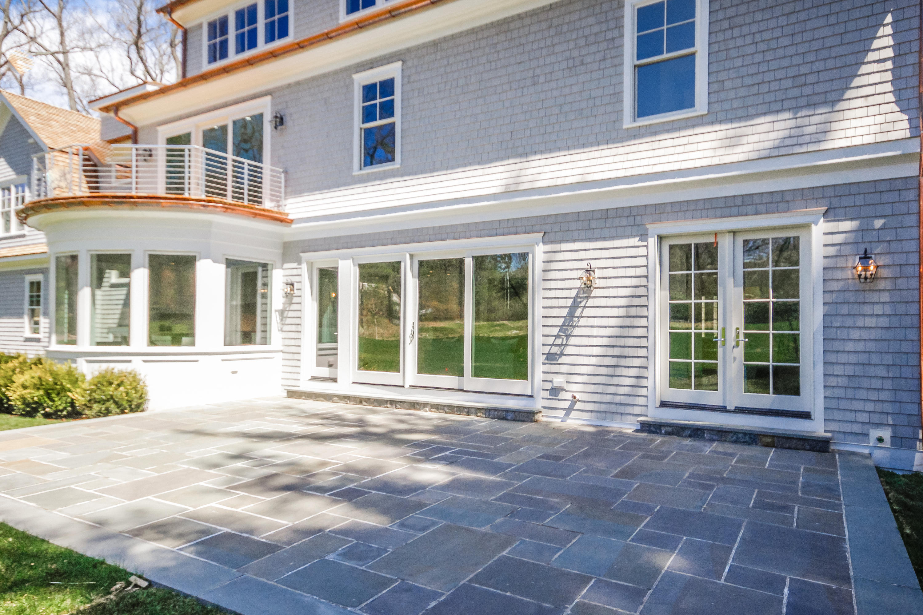 134 Lambert Road New Canaan, CT 06840 - Photo 43 of 50 a view of a house with a yard