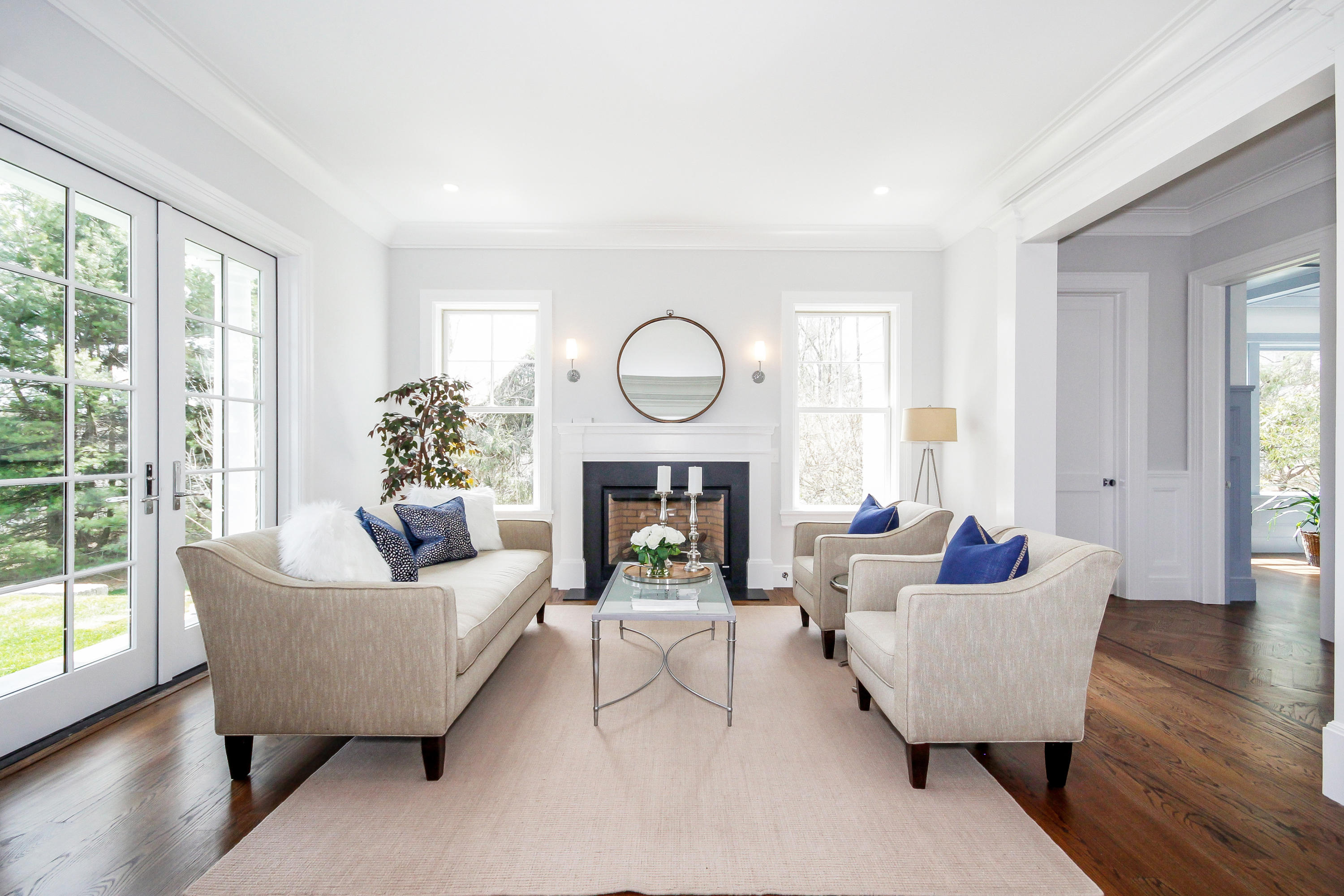 134 Lambert Road New Canaan, CT 06840 - Photo 5 of 50 a living room with furniture and a fireplace