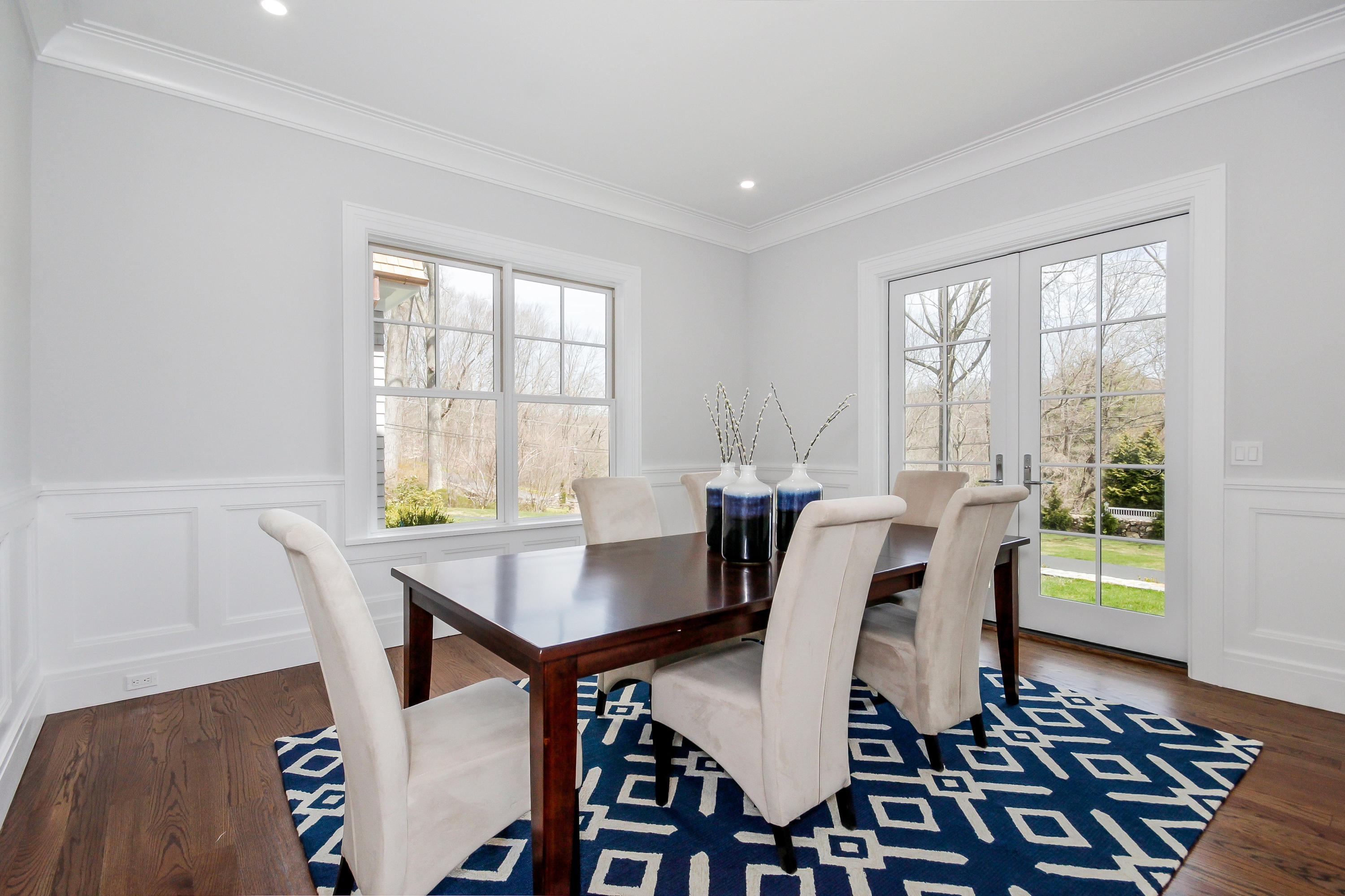 134 Lambert Road New Canaan, CT 06840 - Photo 7 of 50 a view of a dining room with furniture and a window