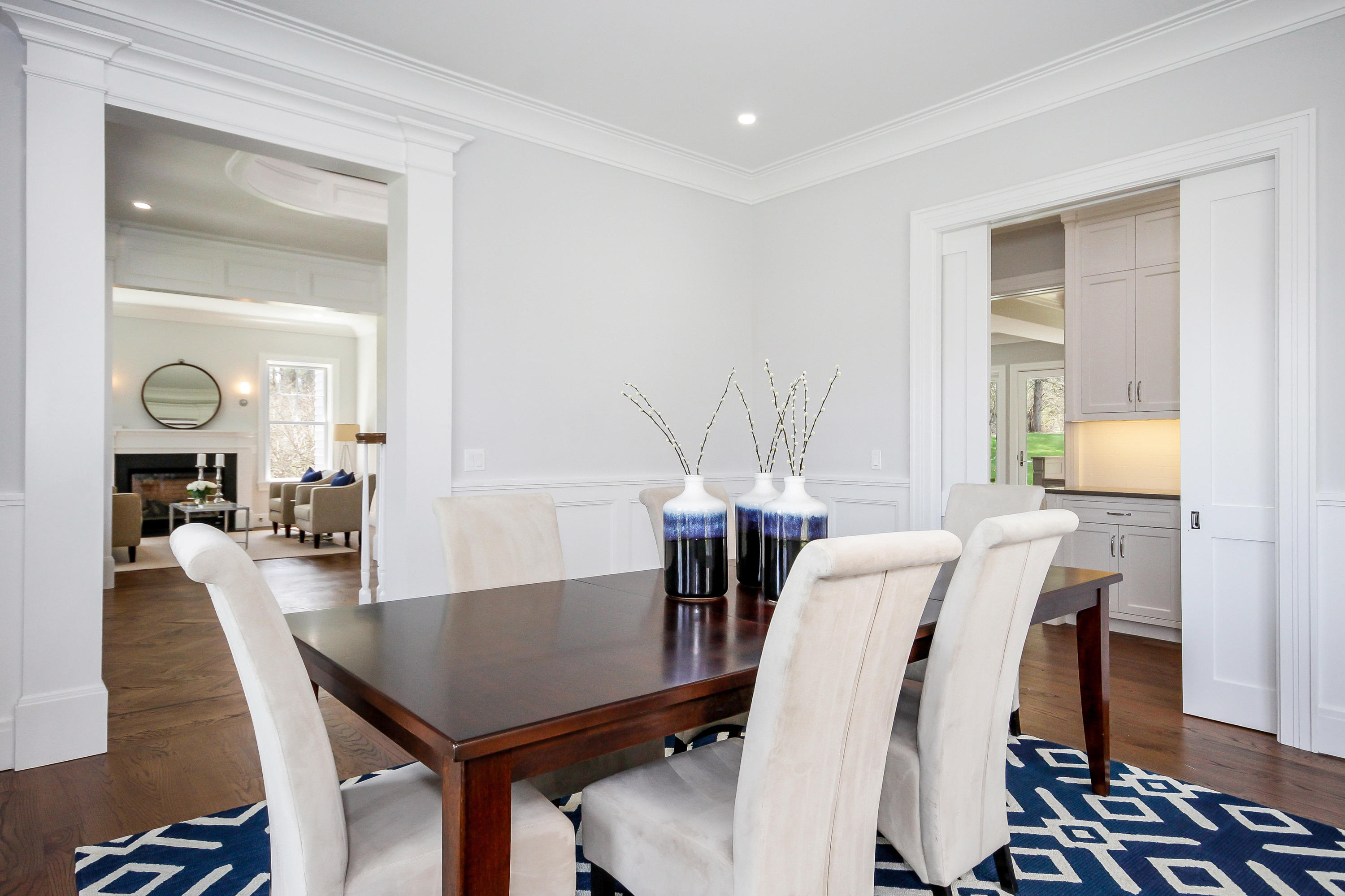 134 Lambert Road New Canaan, CT 06840 - Photo 8 of 50 a view of a dining room with furniture and wooden floor