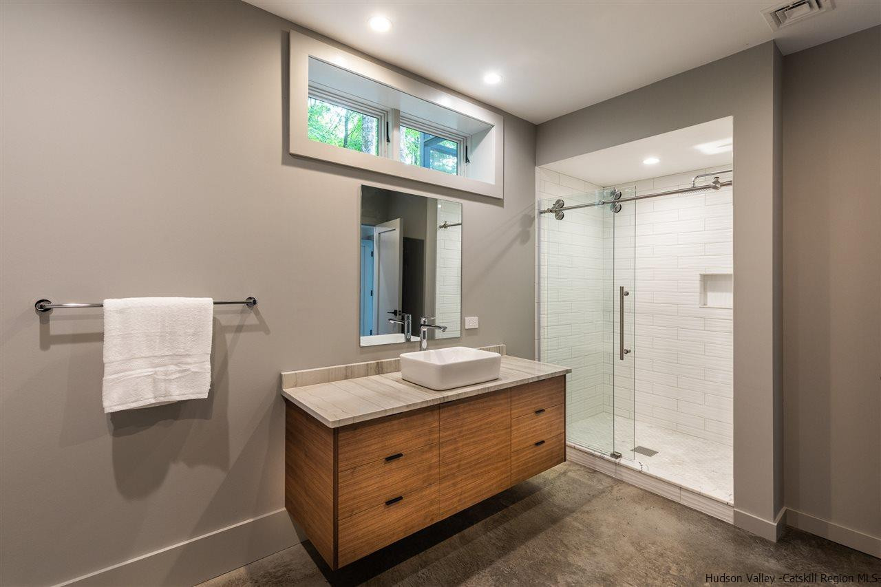 266 Kripplebush Road Stone Ridge, NY 12484 - Photo 32 of 34 a bathroom with a sink and a mirror