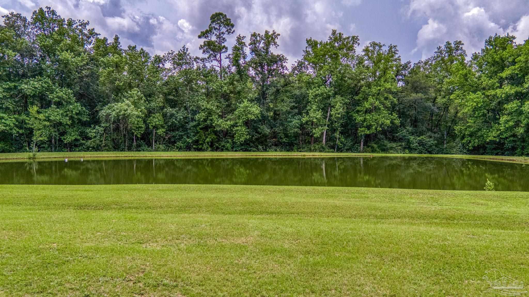 2345 Pompano Street Cantonment, FL 32533 - Photo 44 of 48 a view of a golf course