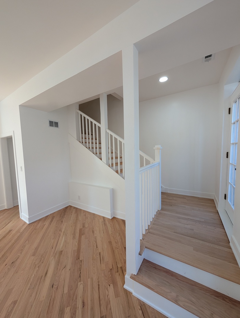 916 North Noble Street, Unit 2F Chicago, IL 60642 - Photo 5 of 22 a view of entryway with wooden floor