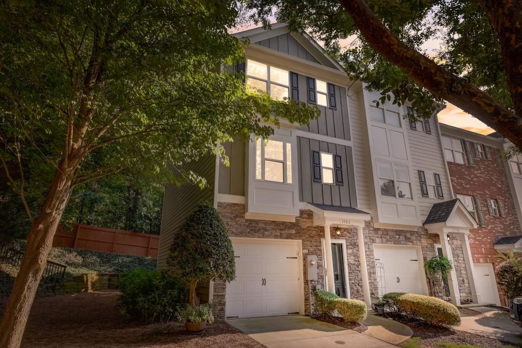 2986 Lauren Parc Road Decatur, GA 30032 - Photo 1 of 1 a front view of a residential apartment building with a yard