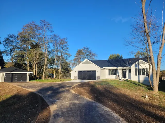 $525,000 | 2821 14 Mile Road Northeast, Sparta, MI 49345