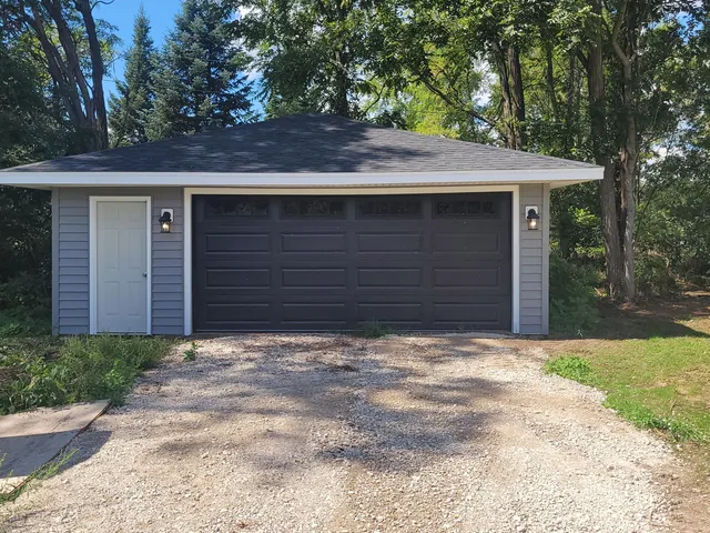 $525,000 | 2821 14 Mile Road Northeast, Sparta, MI 49345