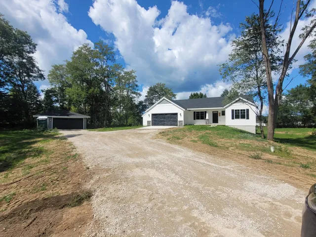 $525,000 | 2821 14 Mile Road Northeast, Sparta, MI 49345