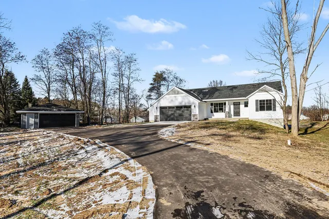 $525,000 | 2821 14 Mile Road Northeast, Sparta, MI 49345