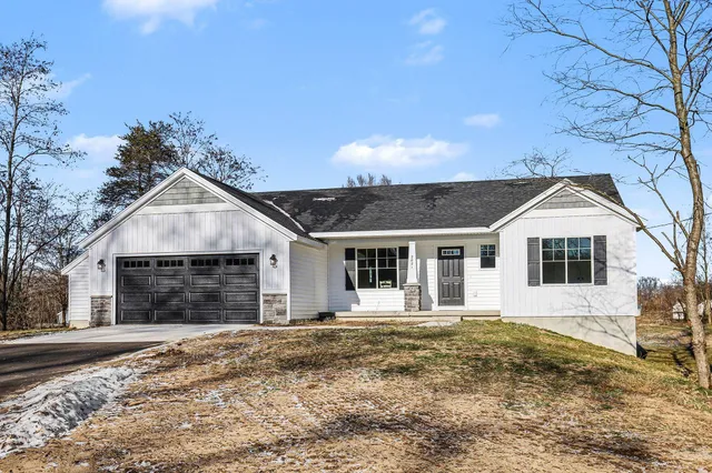 $525,000 | 2821 14 Mile Road Northeast, Sparta, MI 49345