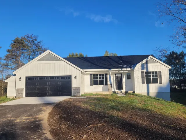 $525,000 | 2821 14 Mile Road Northeast, Sparta, MI 49345