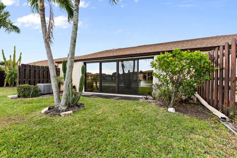 a view of a backyard with a garden