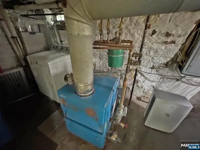 a view of living room with furniture and a flat screen tv