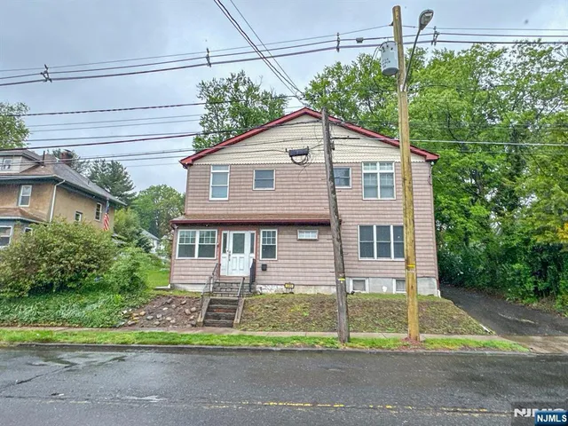 a house view with a outdoor space