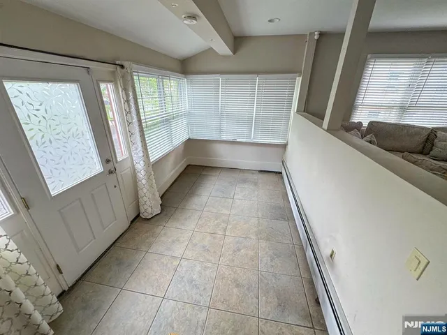 a view of entryway with stairs and furniture