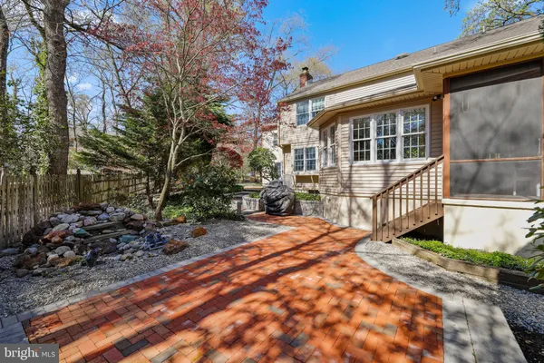 a balcony with next to a yard