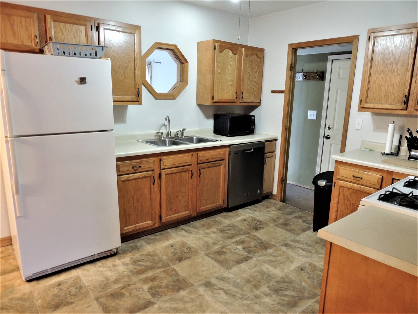 1369 Argyle Road LaSalle, IL 61301 - Photo 7 of 14 a kitchen with sink cabinets and refrigerator