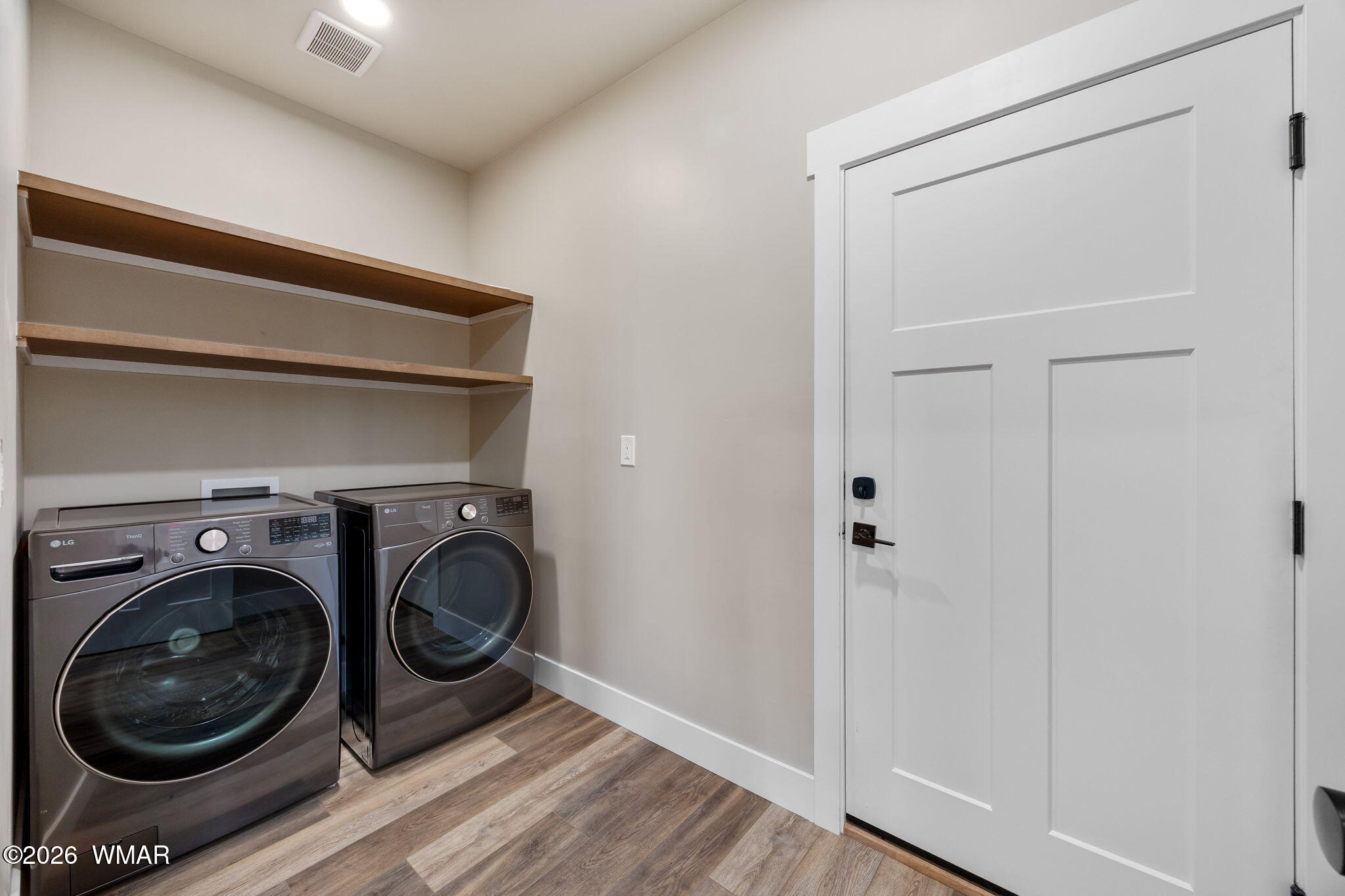 561 South Rock Ridge Drive Show Low, AZ 85901 - Photo 19 of 28 a utility room with dryer and washer