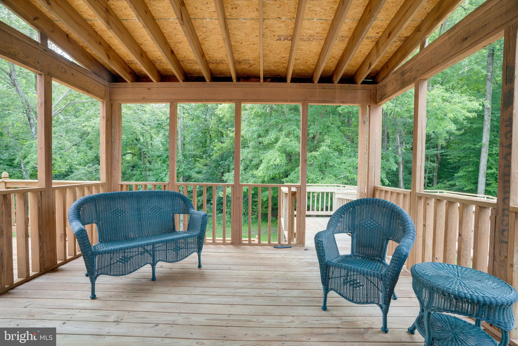 13480 Keytone Road Woodbridge, VA 22193 - Photo 11 of 39 Screened Deck w/access ramp to driveway