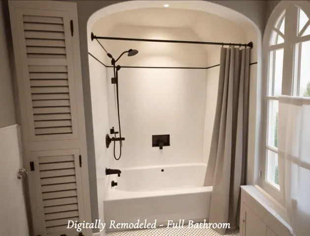a bathroom with a bathtub and a shower