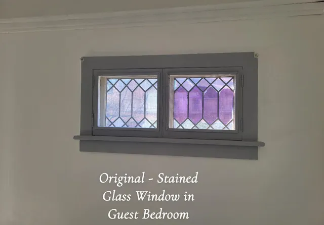 a view of living room kitchen and entryway