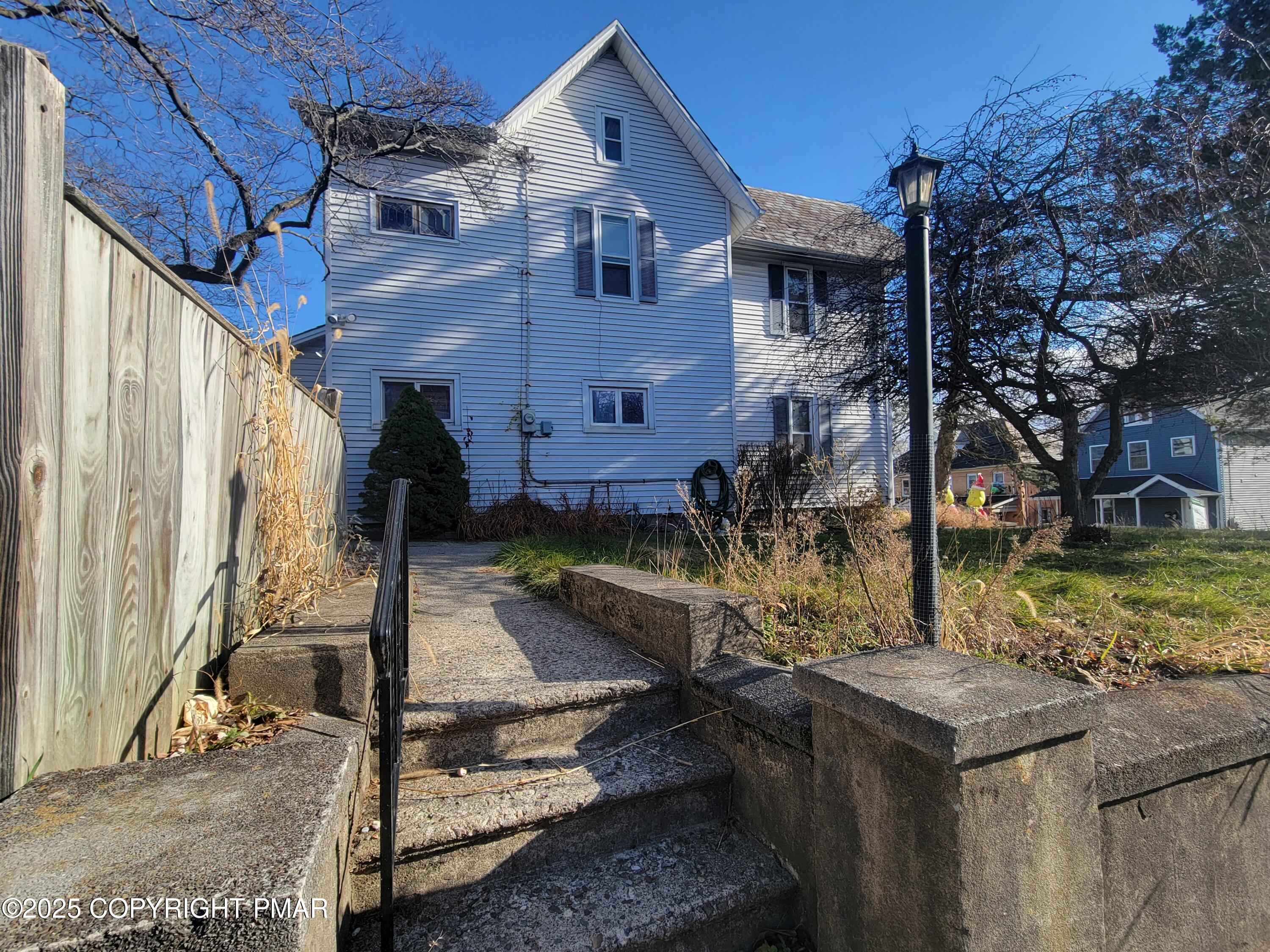 529 Market Street Bangor, PA 18013 - Photo 29 of 33 a front view of a house with garden