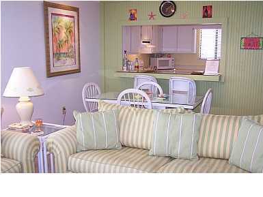 63 Sandy Lane, Unit 101 Santa Rosa Beach, FL 32459 - Photo 4 of 11 a living room with furniture and a window