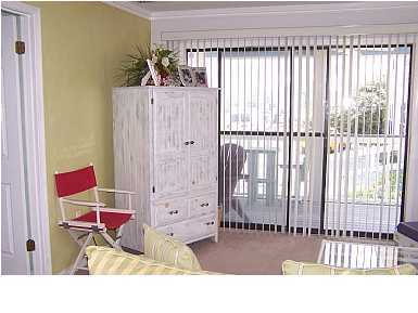 63 Sandy Lane, Unit 101 Santa Rosa Beach, FL 32459 - Photo 5 of 11 a living room with furniture and a large window