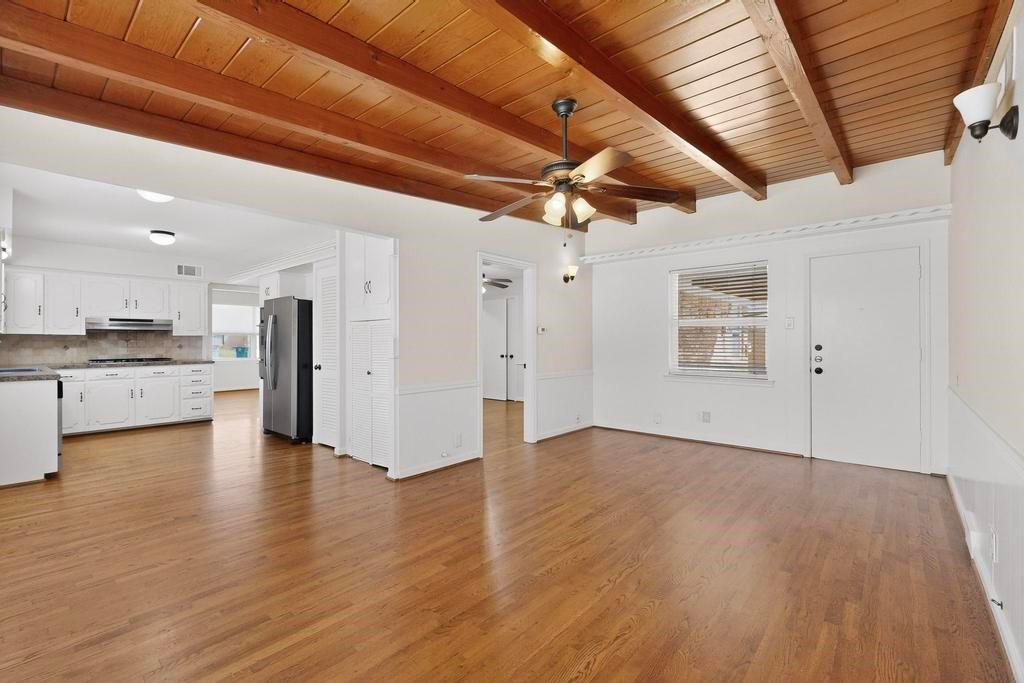 2120 Healey Drive Dallas, TX 75228 - Photo 18 of 39 a view of a livingroom with wooden floor