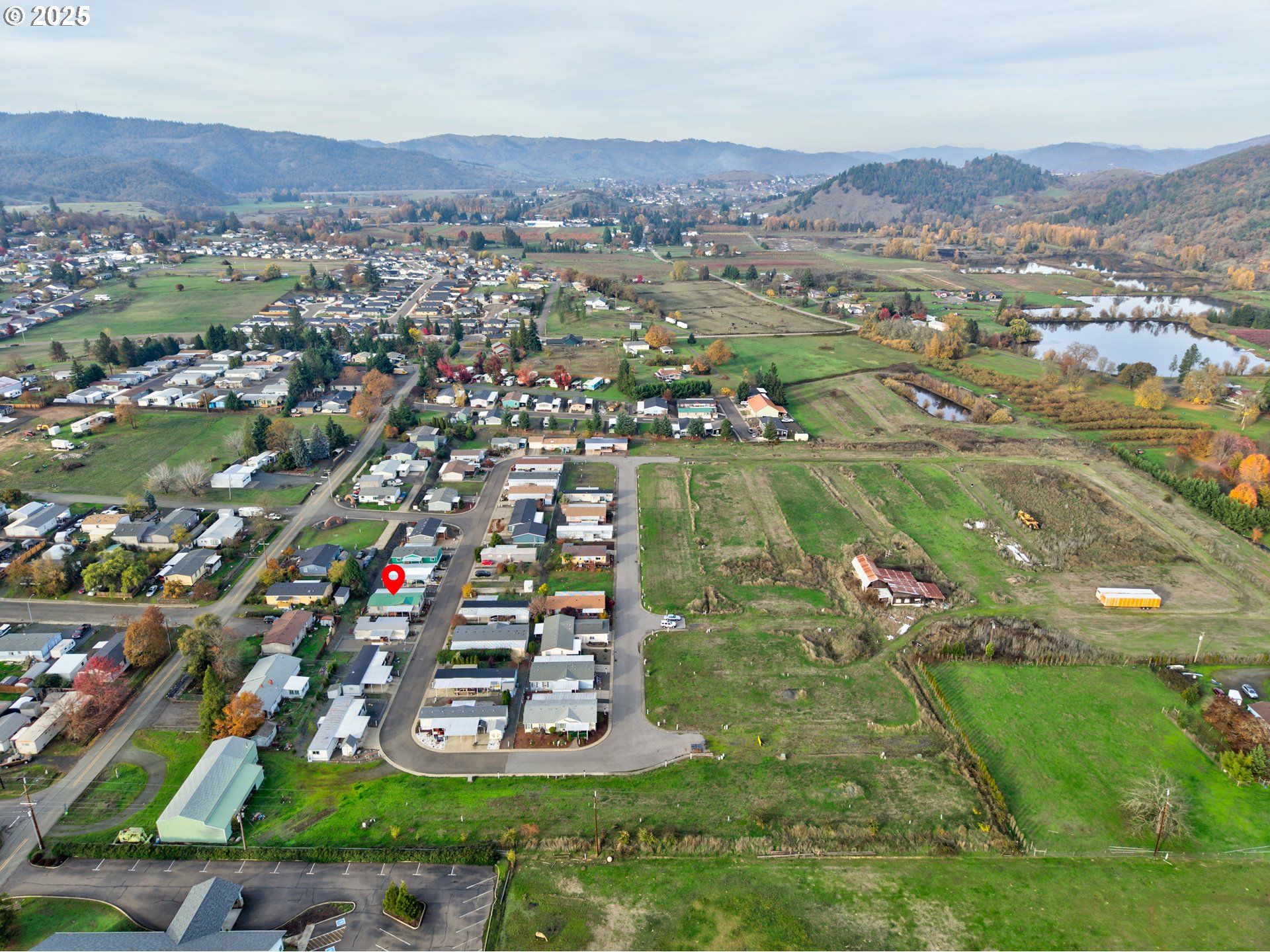 125 Estate Loop Winston, OR 97496 - Photo 42 of 45 an aerial view of a city