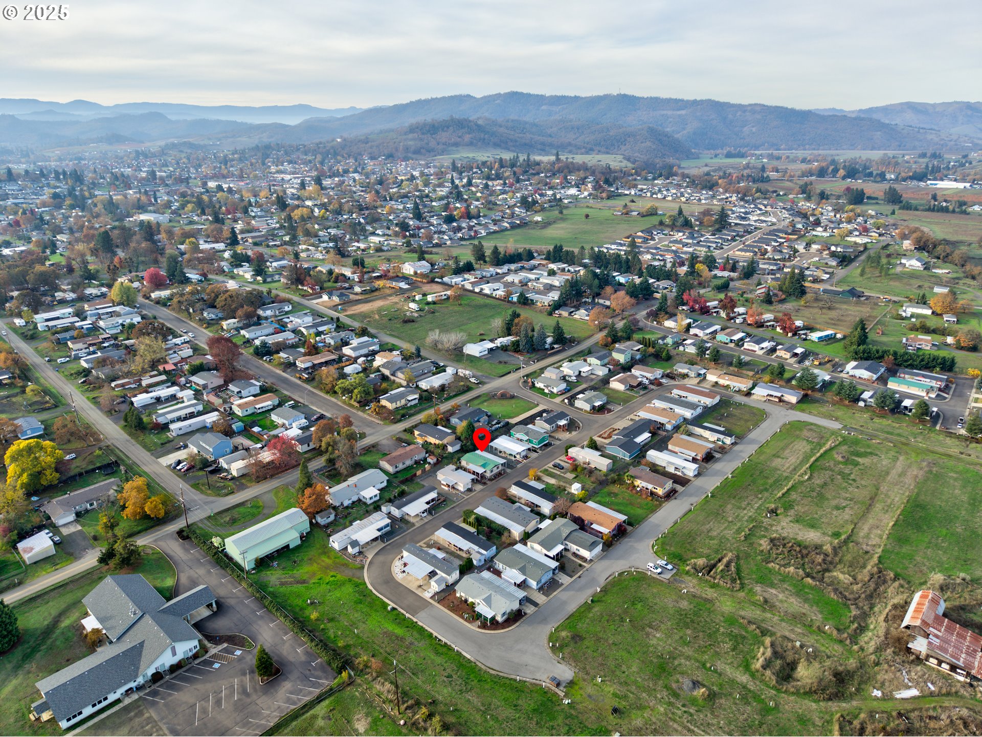 125 Estate Loop Winston, OR 97496 - Photo 43 of 45 an aerial view of a city