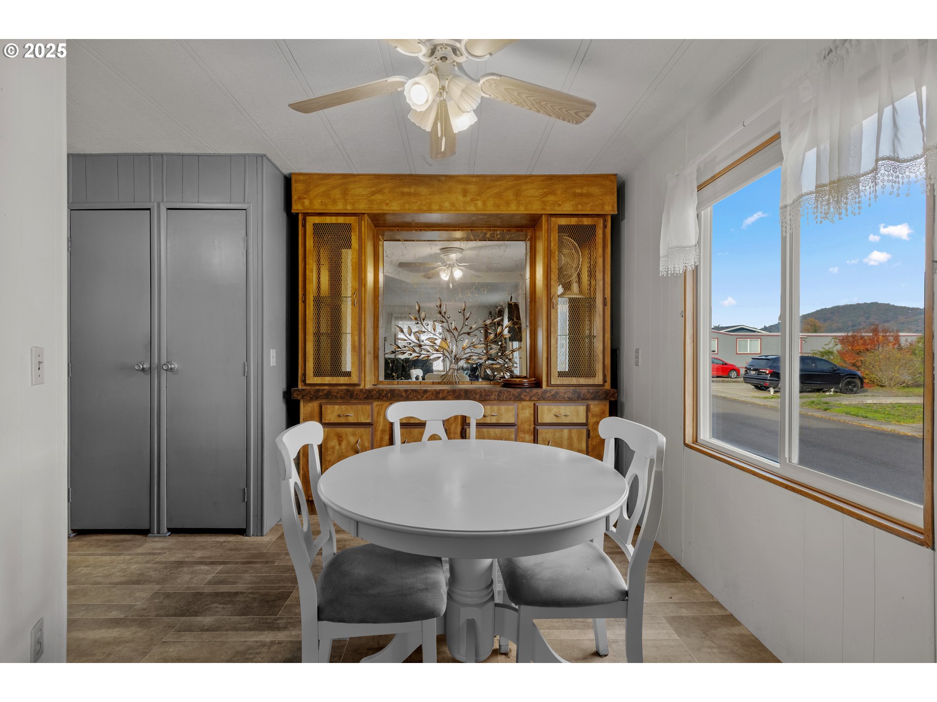125 Estate Loop Winston, OR 97496 - Photo 10 of 45 a dining room with furniture and a window