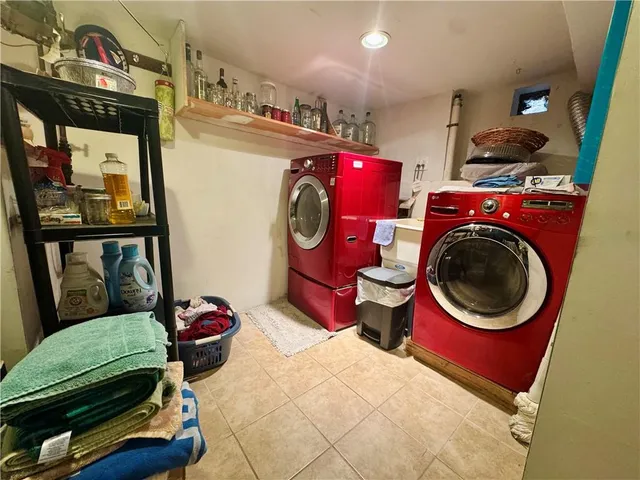 a bedroom with a bed and a mirror