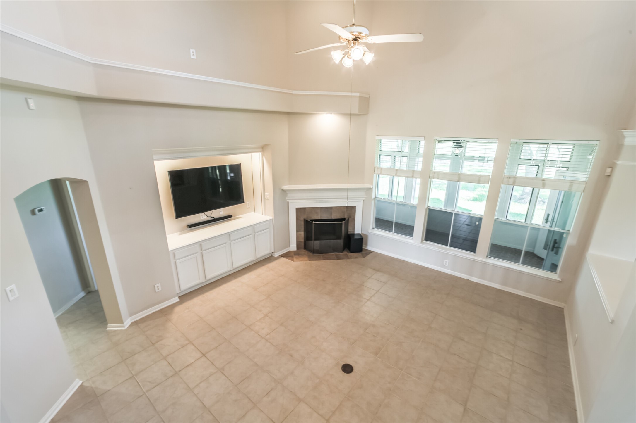4903 Bowser Road Fulshear, TX 77441 - Photo 15 of 50 a view of a livingroom with a flat screen tv