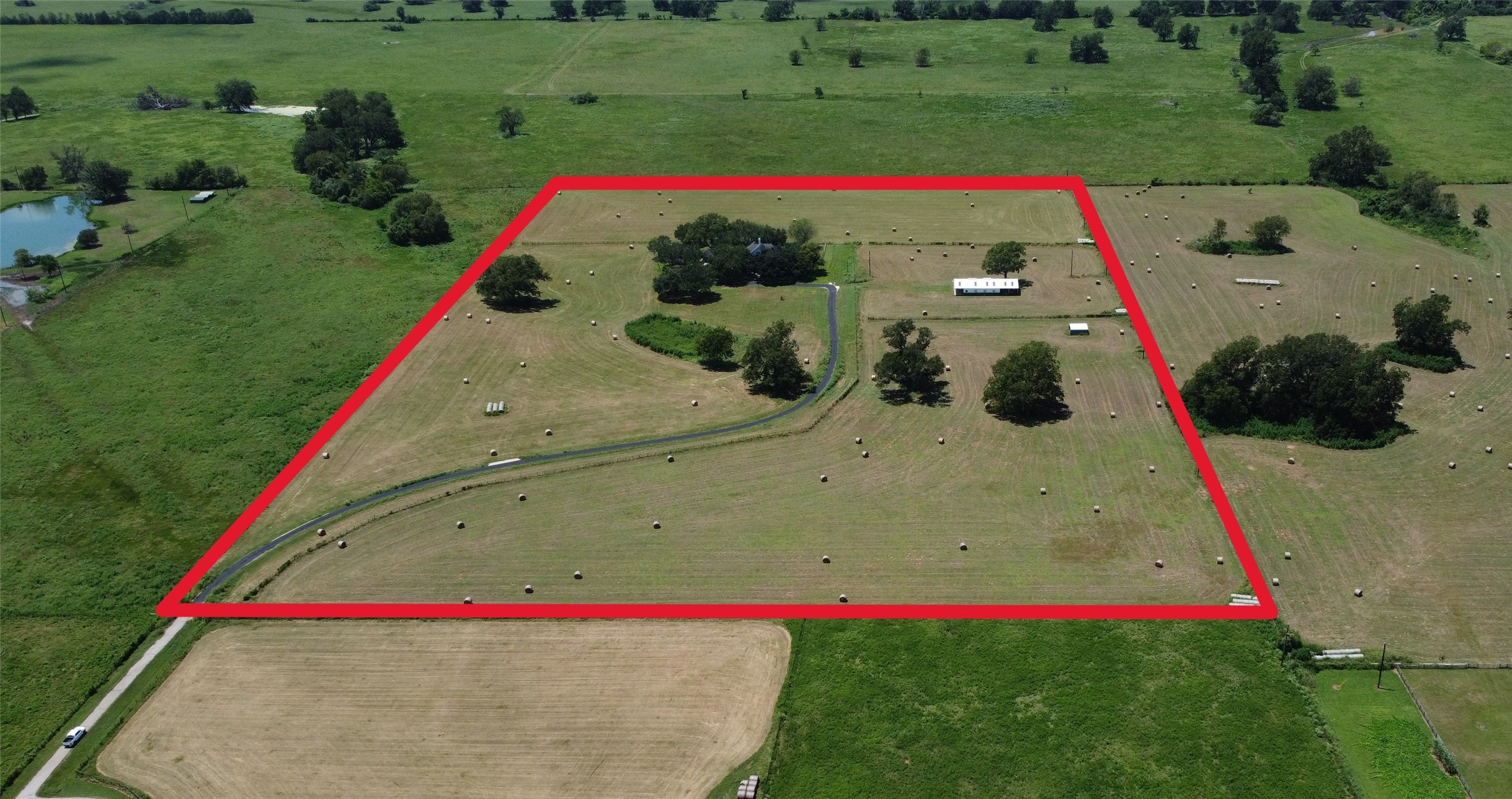 4903 Bowser Road Fulshear, TX 77441 - Photo 2 of 50 a view of yard with swimming pool and green space